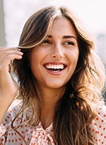 Young woman with healthy flawless smile
