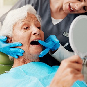 Woman listening to dentist during consultation