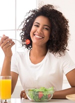 woman eating a salad 