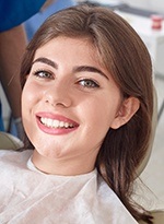 Woman smiling in dental chair