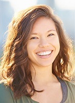 Young woman with flawless white smile